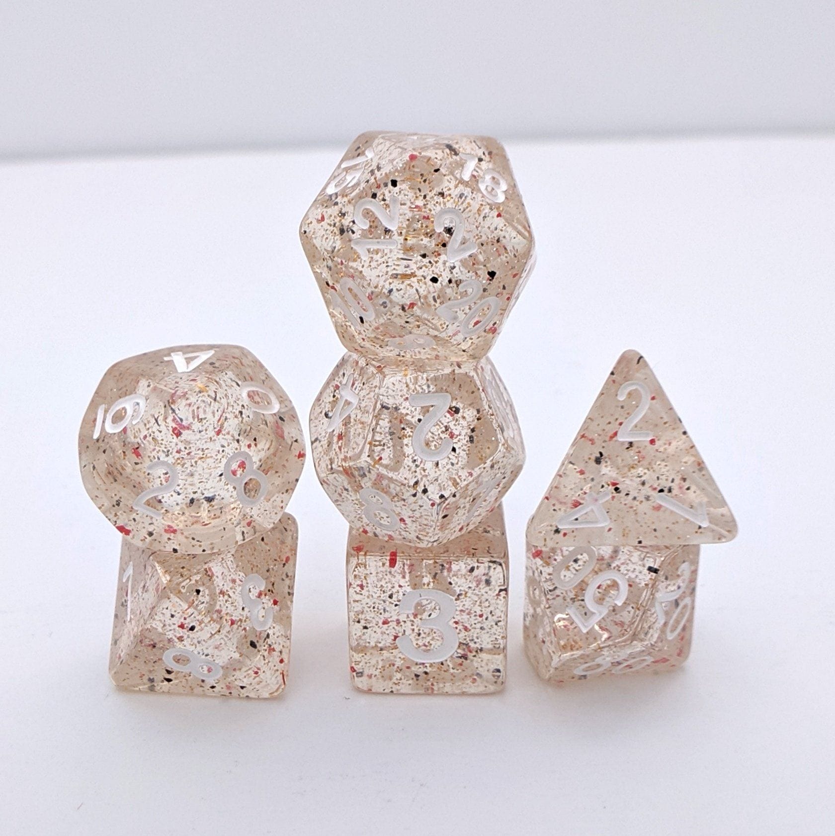 Little Stars Dice Set – 7-Piece Translucent Golden Glitter Red Black Particles Dice sets Fennek and Finch