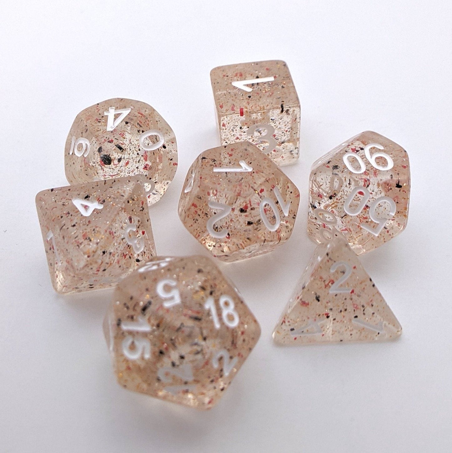 Little Stars Dice Set – 7-Piece Translucent Golden Glitter Red Black Particles Dice sets Fennek and Finch