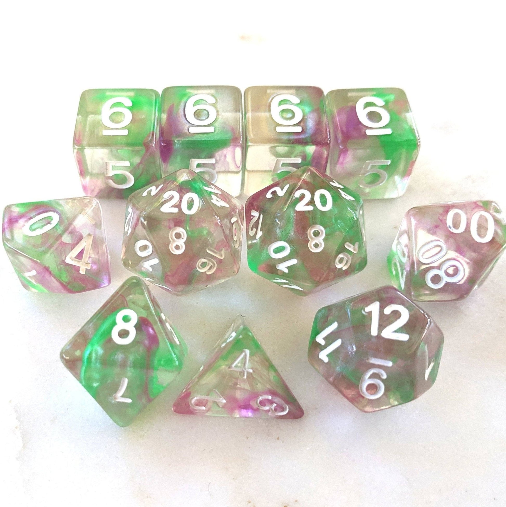 Mystic Swirl Dice Set – Clear Resin with Purple & Green Ink (11 - Piece) - Fennek and Finch