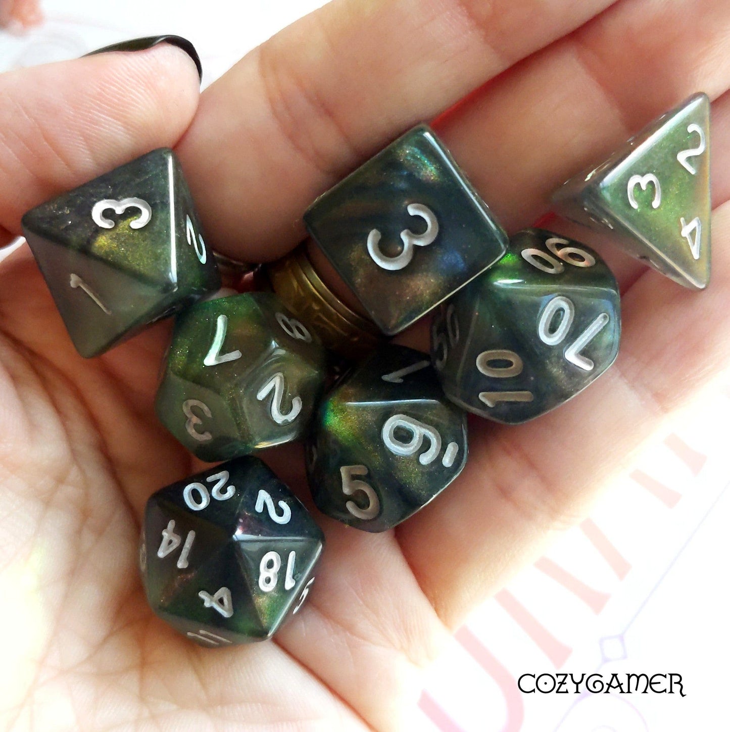 Night Wish Dice Set. Almost black shimmering dice set with hidden green and red