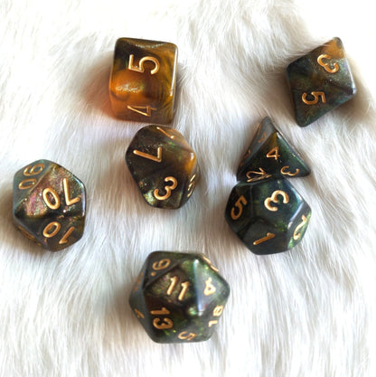 Nightingale Dice Set – 7-Piece Green Orange Gold Red Micro Shimmer Galaxy DnD Dice sets Fennek and Finch