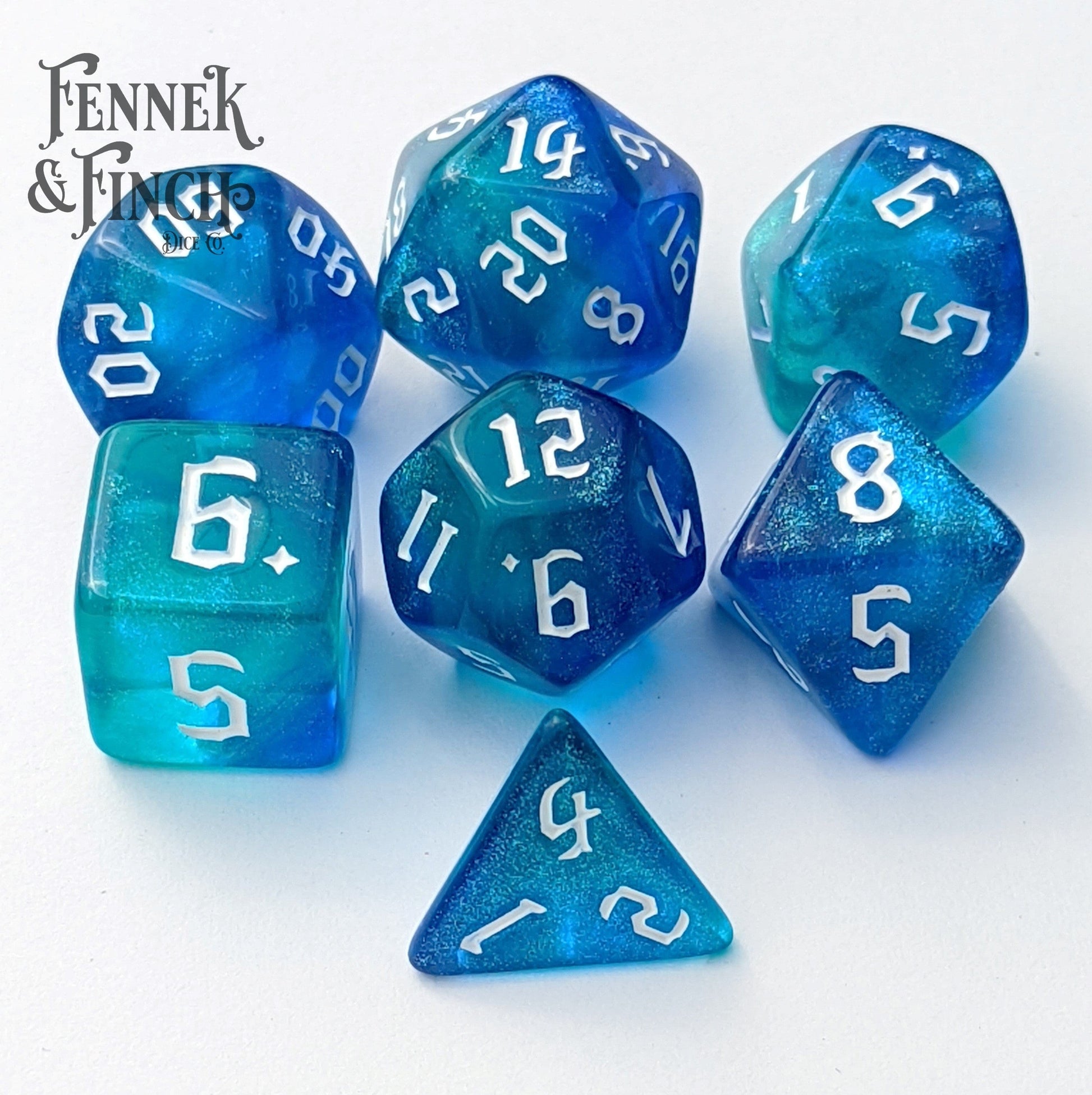 Marbled blue shimmering Oasis Dice Set with seven polyhedral pieces for tabletop RPGs like Dungeons and Dragons.