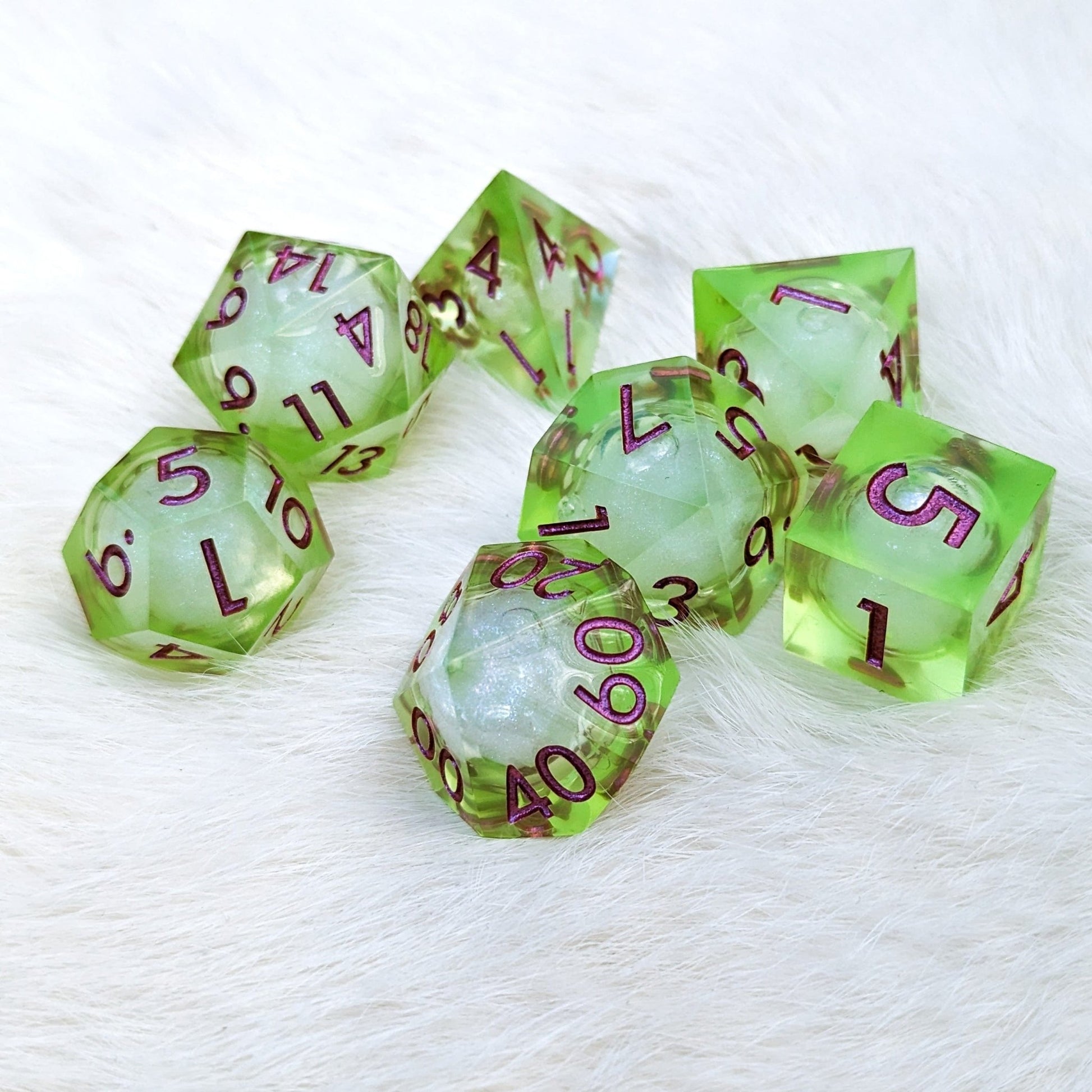 Ooze Liquid Core Sharp Edge Dice Set – 7 - Piece Bright Green Burgundy Font DnD - Fennek and Finch