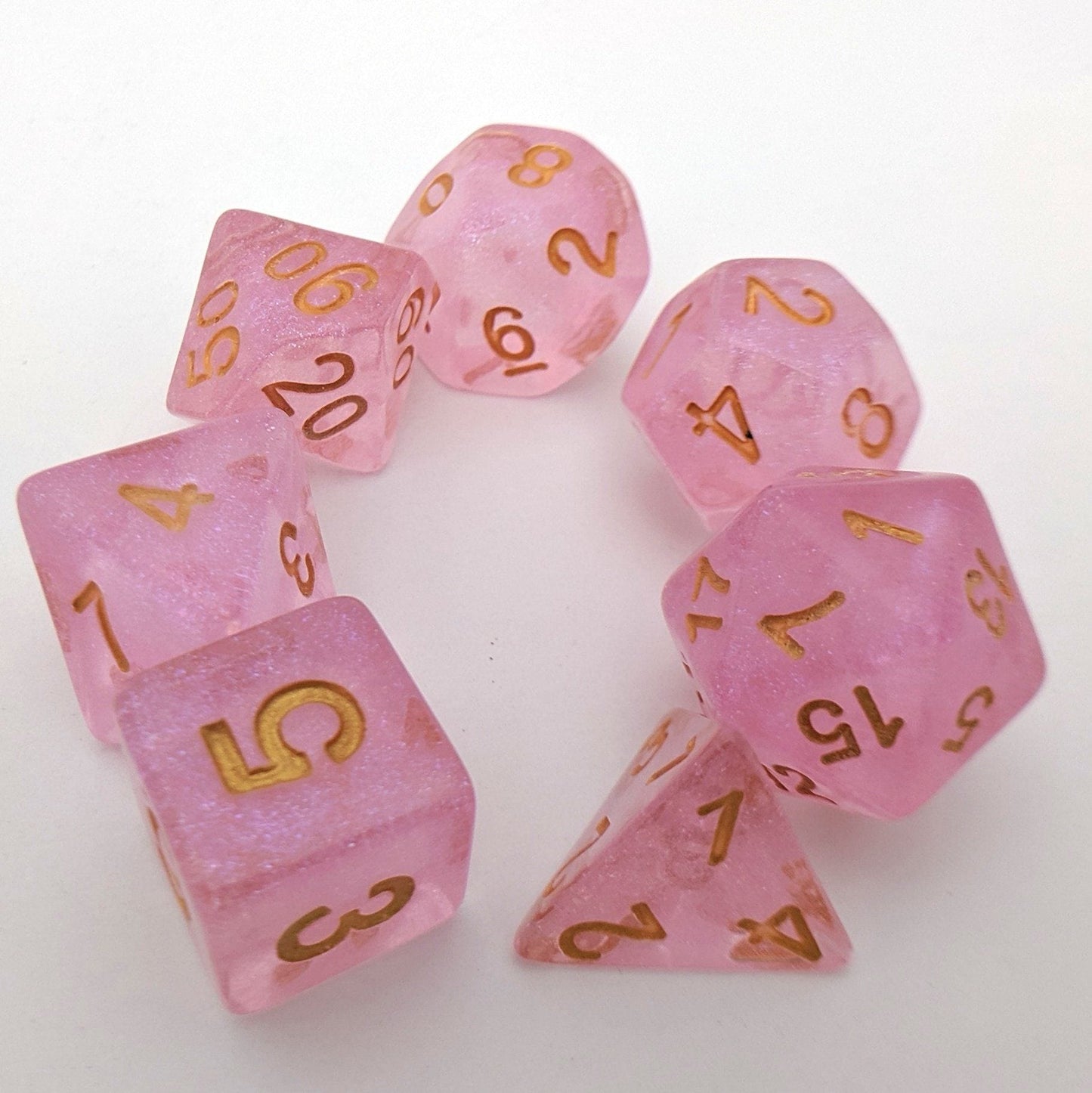 Pink Glitter Dice Set – 7 - Piece Clear Pink Micro Glitter Gold Font Resin DnD - Fennek and Finch