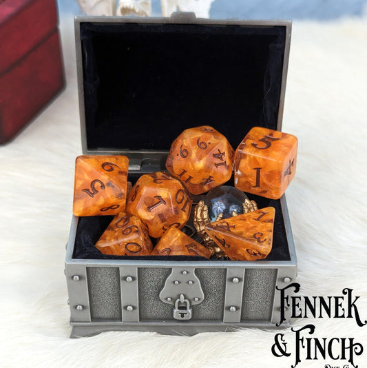 Pumpkin Pie orange DnD dice set in a treasure chest, perfect for autumn-themed RPG adventures and cozy gaming sessions.