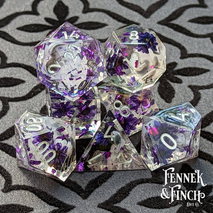 Purple Flower Dice Set – 7 - Piece Sharp Edge Clear Wispy Clouds DnD Dice - Fennek and Finch