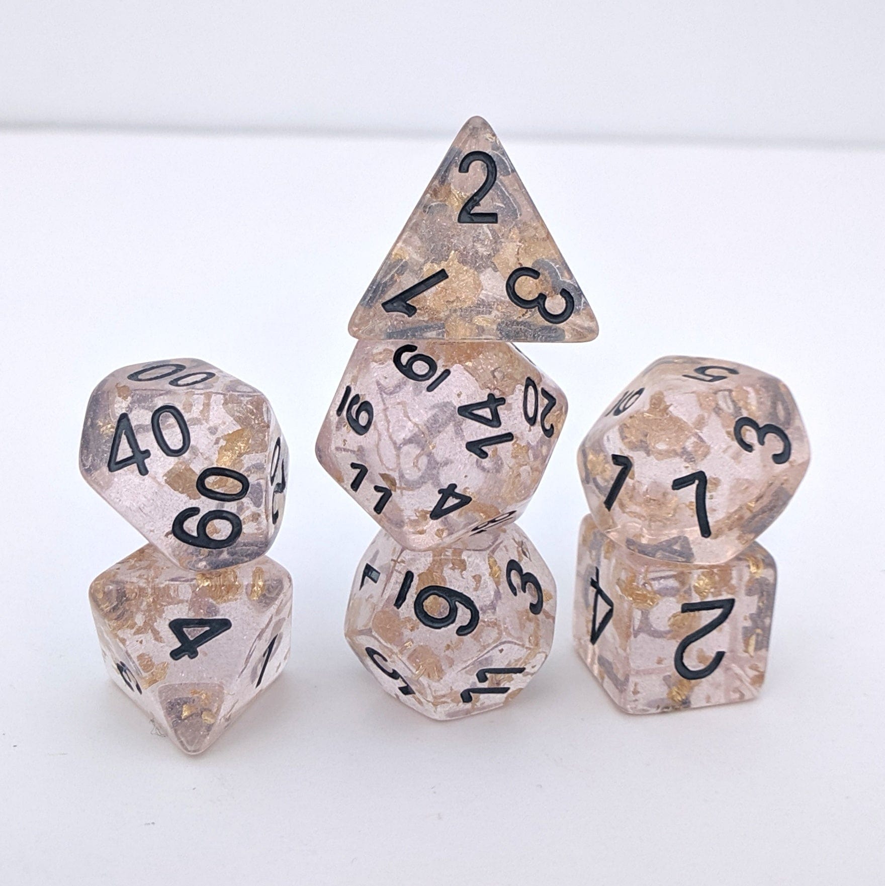 Rose Scepter Dice Set – 7-Piece Translucent Micro Glitter Gold Foil Black Font Dice sets Fennek and Finch
