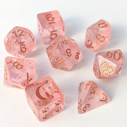 Sakura Cloud 8 Piece Dice Set with pink resin, copper font, cat wizard D6, paw counters, and cloud design for CozyGamers.