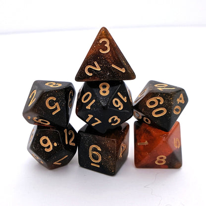 Black and orange glitter Searing Galaxy DnD Dice Set, perfect for Dungeons and Dragons and Magic the Gathering tabletop games.