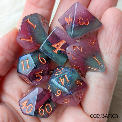 Shimmering Fluorite, a green and purple layered DND dice set