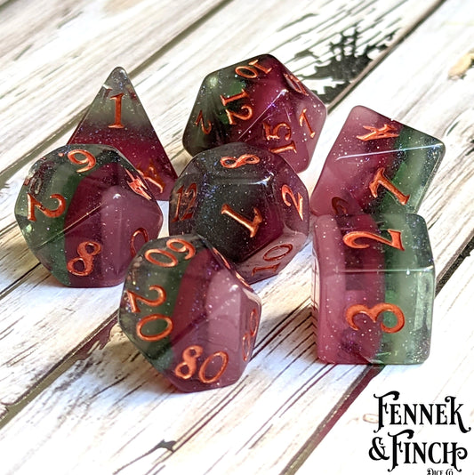 Shimmering Fluorite, a green and purple layered DND dice set
