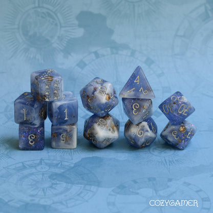 Snow Peak Dice Set. Clear Periwinkle and White Marble, with Glitter and Foil 12 Piece Set