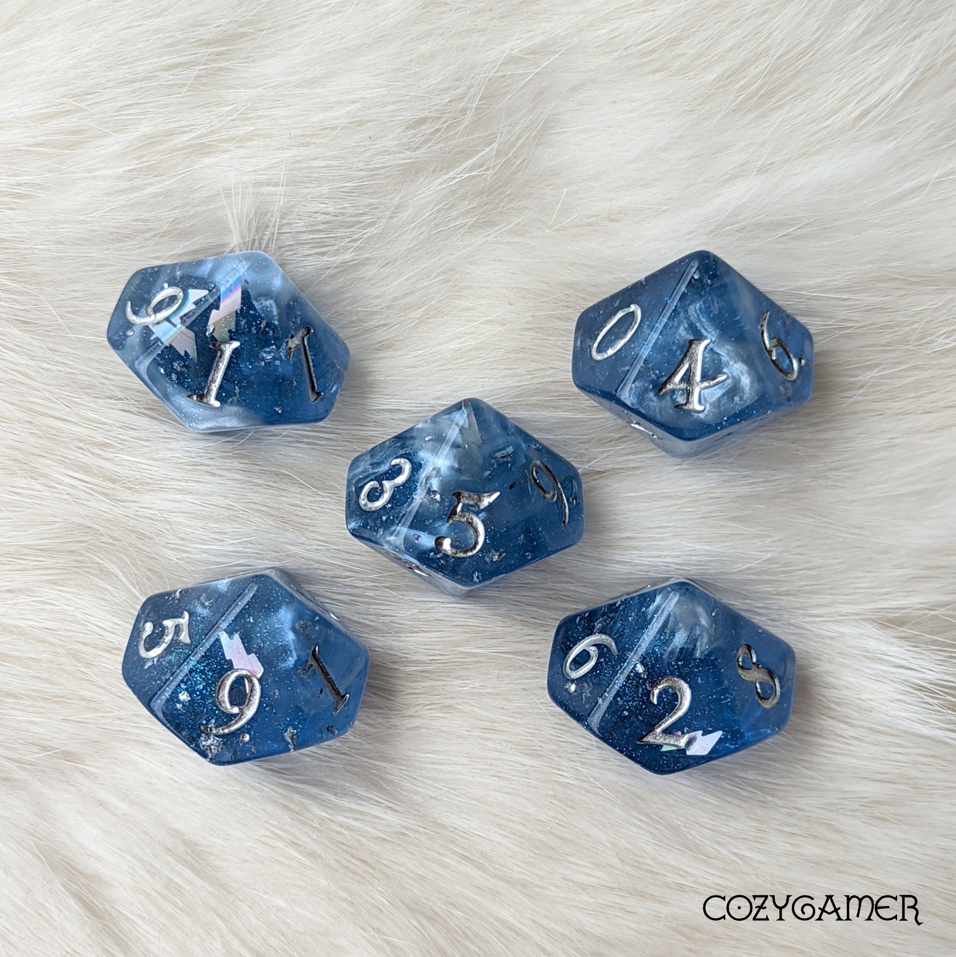 Storm Daddy Dice Set. Dark blue with white clouds and lightning. 11 Piece, 7 Piece, D10, and D6 Sets D10 Set