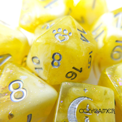 Sunlight 8 Piece Dice Set. Clear Yellow and White Marble, with Glitter and Foil