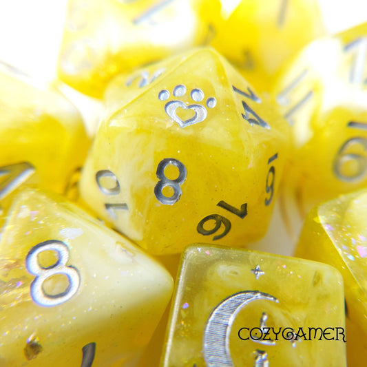 Sunlight 8 Piece Dice Set. Clear Yellow and White Marble, with Glitter and Foil Dice sets Fennek and Finch