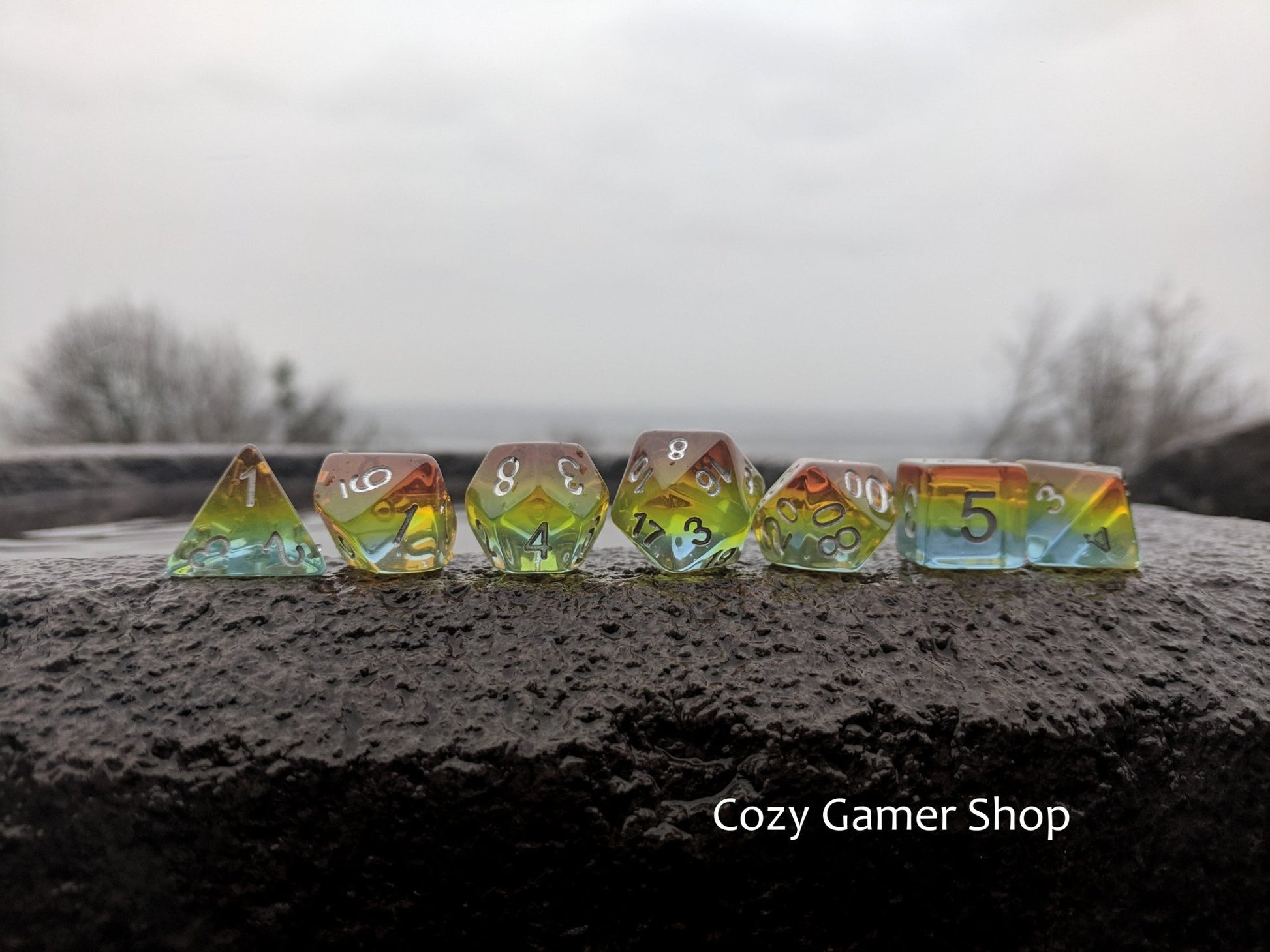 Sunrise Dice Set – Layered Blue, Green, Yellow & Orange with Silver Numbers - Fennek and Finch