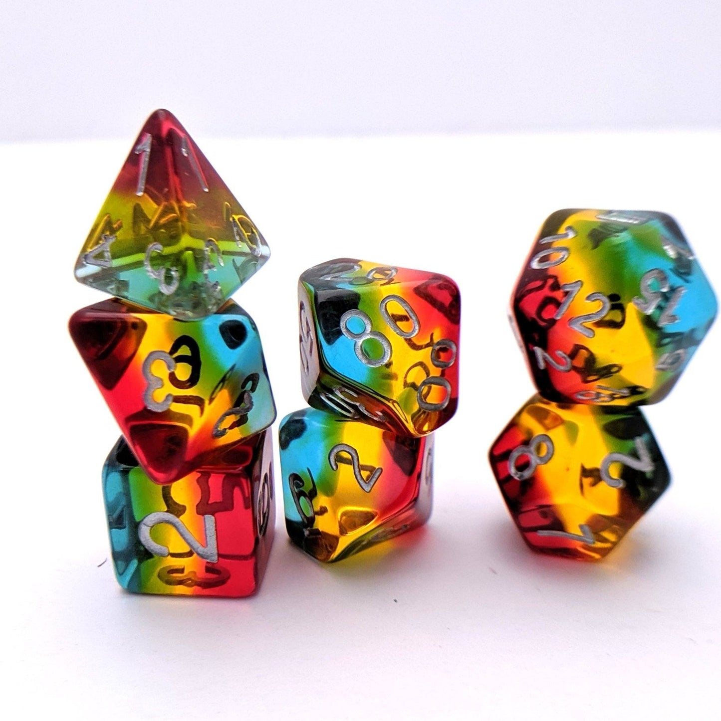 Tropicool Dice Set – 7 - Piece Blue Green Yellow Red Layered Transparent Resin DnD - Fennek and Finch