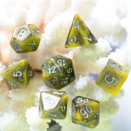 Yellow and grey 7-piece Venom Dice Set for DnD games, featuring shimmer acrylic polyhedral designs on a soft white background.