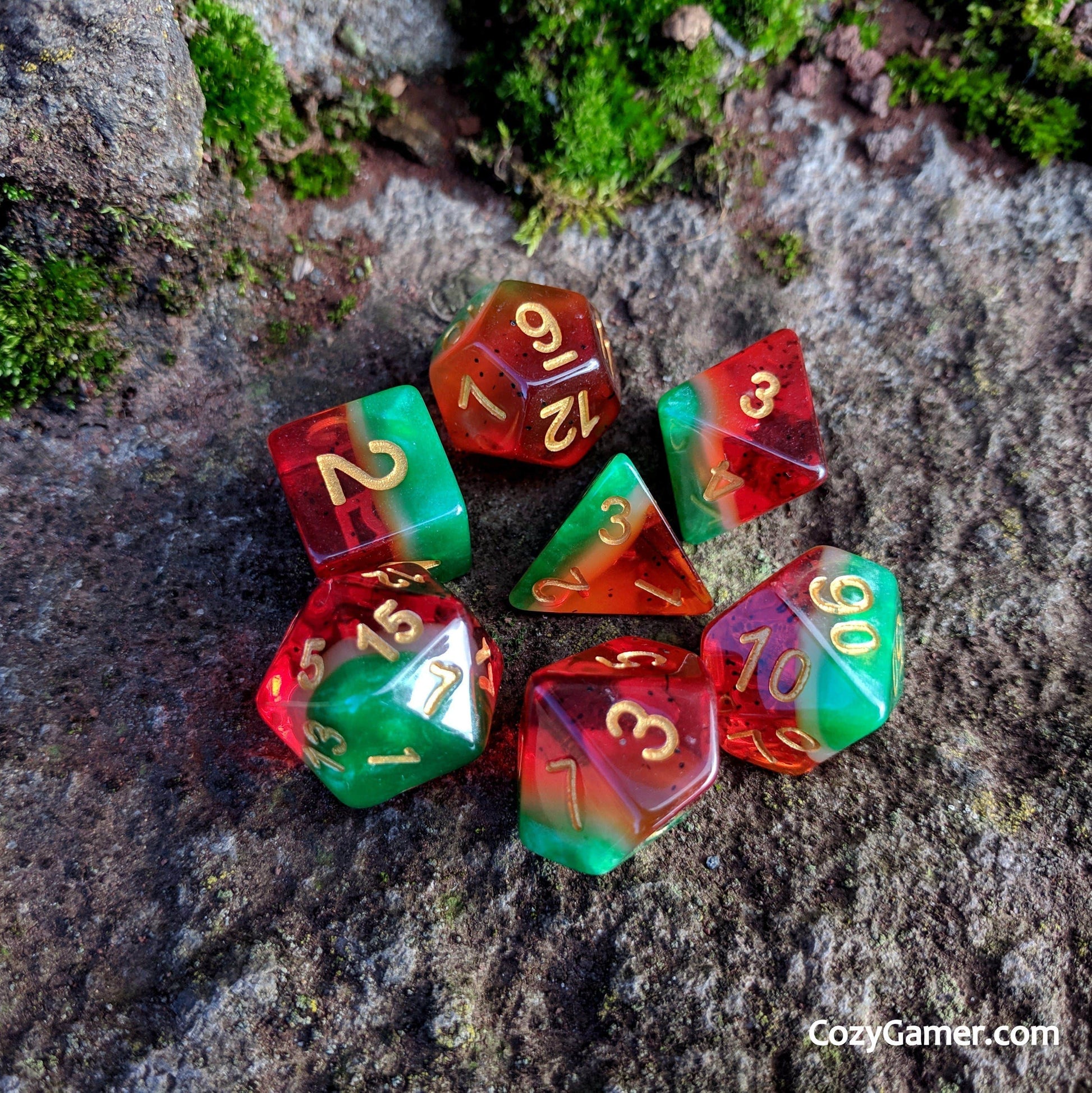 Watermelon DnD Dice Set with red, white, and green transparent polyhedral dice on a stone surface, perfect for tabletop games.