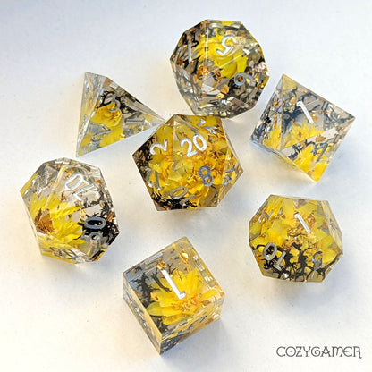 Yellow Flowers and Black Moss Sharp Edge Resin Dice Set. 7 Piece DND dice set with real dried flowers.